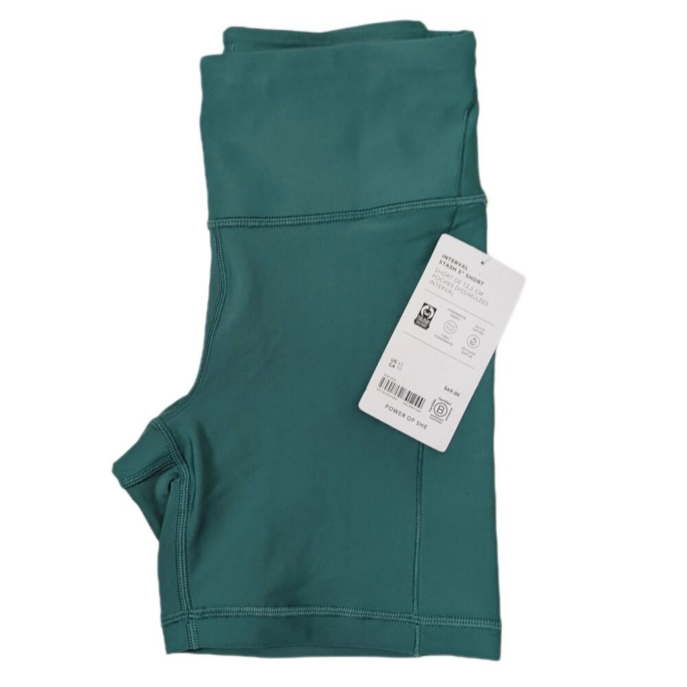 Athleta XS green Interval stash 5" short biker compression gym run work out yoga